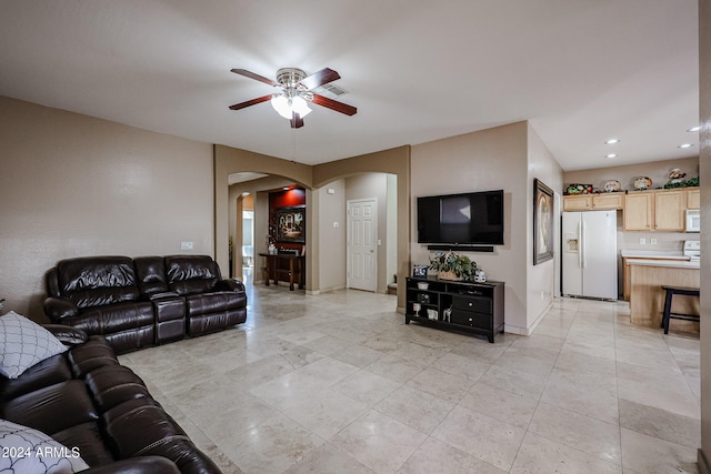 living room featuring ceiling fan