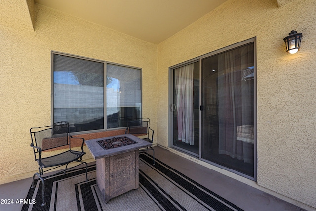 view of patio / terrace featuring a fire pit