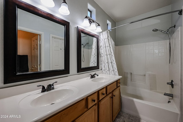 bathroom featuring vanity and shower / bathtub combination with curtain