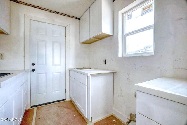 kitchen with white cabinetry