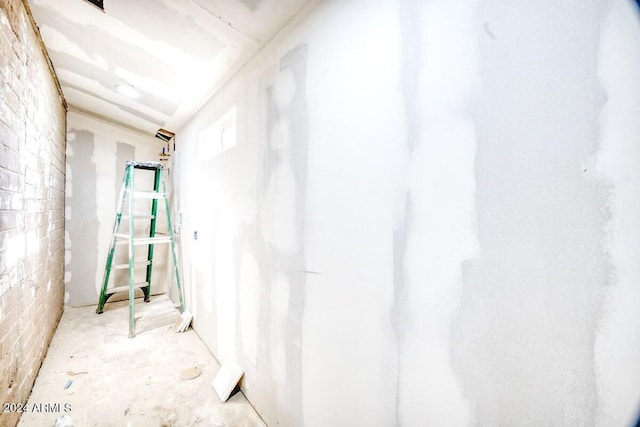 bathroom with concrete flooring