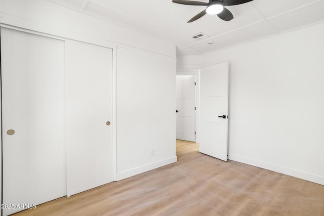 unfurnished bedroom featuring ceiling fan and light hardwood / wood-style flooring