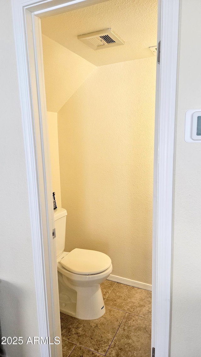 14620 N Yerba Buena Way Unit B, Fountain Hills, AZ 85268 - bathroom with toilet, tile patterned floors, and baseboards
