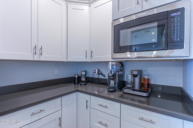 kitchen with white cabinets