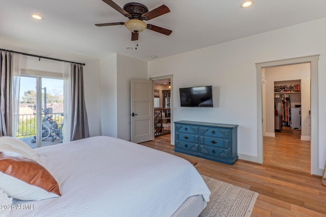 bedroom with ceiling fan, access to outside, and light wood-type flooring