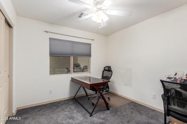 carpeted office with ceiling fan