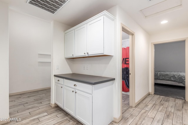 kitchen with white cabinets