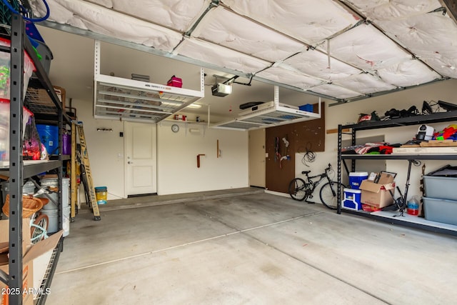 garage featuring a garage door opener