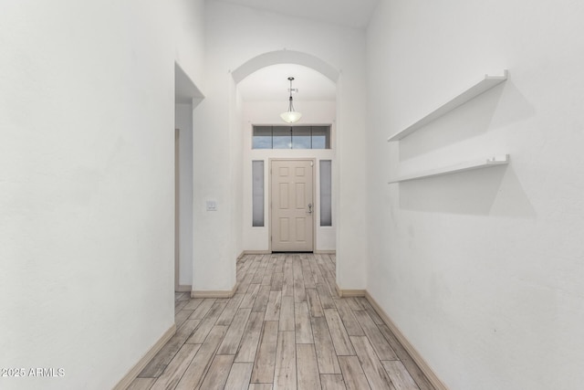 hallway featuring light wood-type flooring