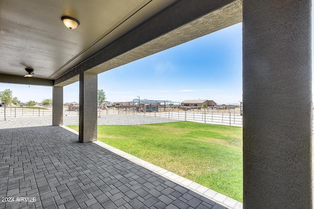 view of patio with ceiling fan