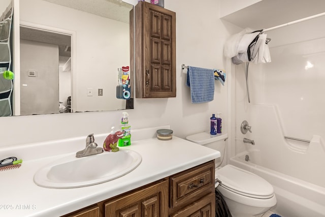 full bathroom featuring toilet, shower / washtub combination, and vanity