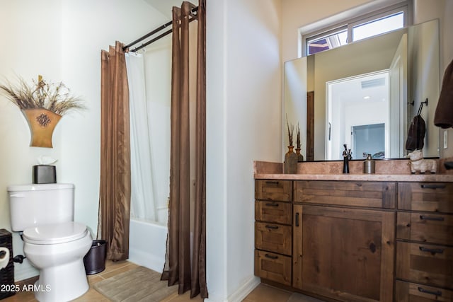 full bathroom with tile patterned flooring, vanity, shower / bath combination with curtain, and toilet