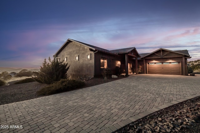 ranch-style house featuring a garage