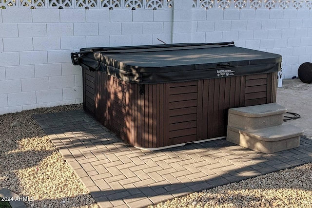 view of patio featuring a hot tub