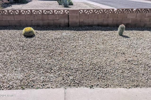 exterior details featuring fence