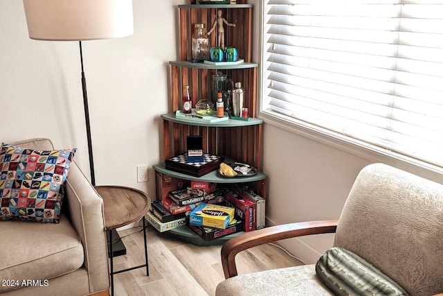 sitting room featuring wood finished floors