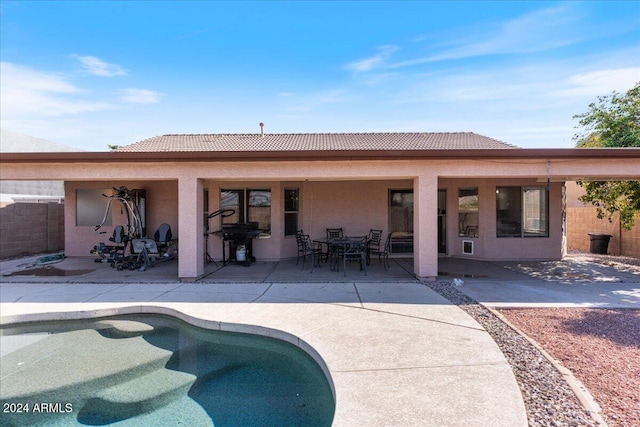 back of house featuring a patio area