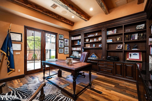 home office featuring beamed ceiling, dark wood finished floors, and baseboards