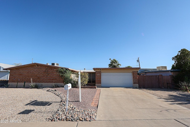 2933 W Del Mar Ln, Phoenix, AZ 85053 - ranch-style home with driveway, brick siding, and a garage