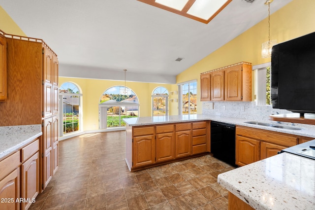4701 N Sheridan Ln, Prescott Valley, AZ 86314 - kitchen with black dishwasher, a peninsula, vaulted ceiling, plenty of natural light, and pendant lighting