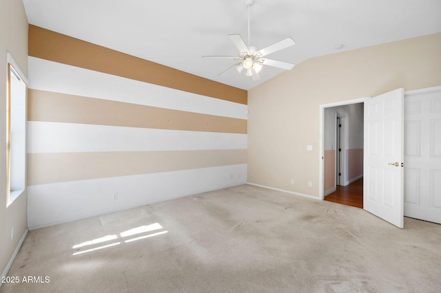 4701 N Sheridan Ln, Prescott Valley, AZ 86314 - empty room with lofted ceiling, ceiling fan, carpet flooring, and baseboards
