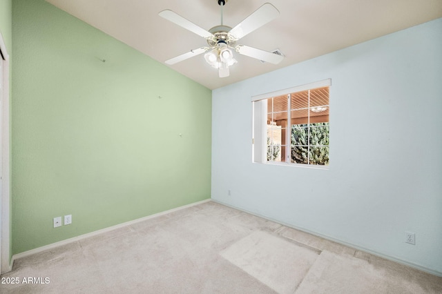 4701 N Sheridan Ln, Prescott Valley, AZ 86314 - unfurnished room featuring carpet flooring, baseboards, a ceiling fan, and vaulted ceiling