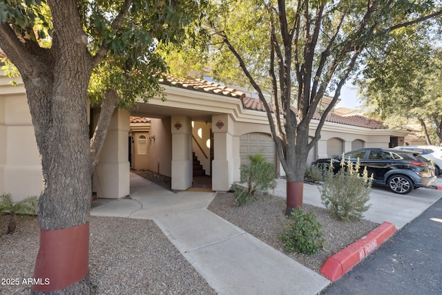 view of front of property with a garage