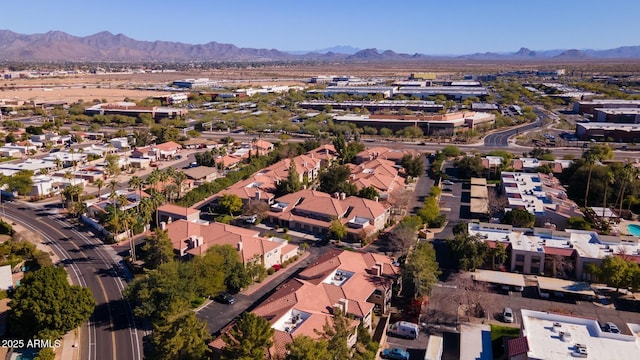 birds eye view of property featuring a mountain view