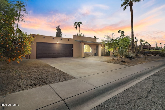 adobe home with a garage