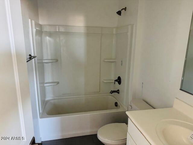 full bathroom with vanity, toilet, and  shower combination