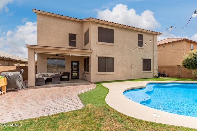 view of pool with a fenced in pool, outdoor lounge area, a patio, and a fenced backyard