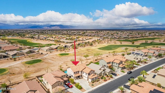 birds eye view of property with a residential view and view of golf course