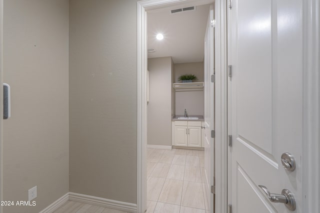 hallway with sink