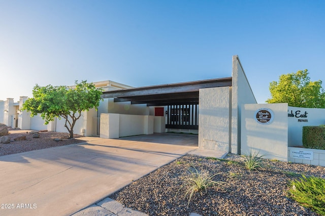 view of front of property with a carport