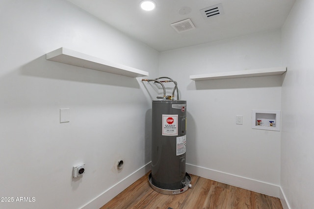 laundry area featuring washer hookup, hardwood / wood-style flooring, electric dryer hookup, and water heater