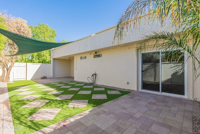 rear view of property with a patio area