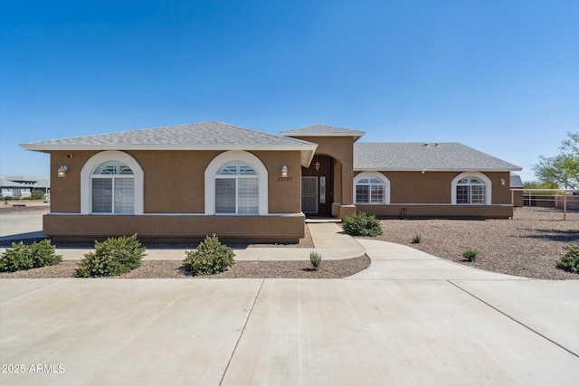 23705 N Chaps Dr, Florence, AZ 85132 - view of front facade featuring stucco siding