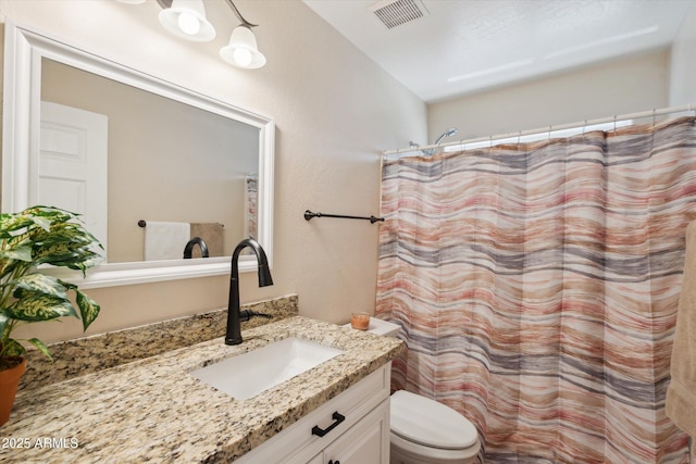 23705 N Chaps Dr, Florence, AZ 85132 - full bath featuring vanity, toilet, and curtained shower