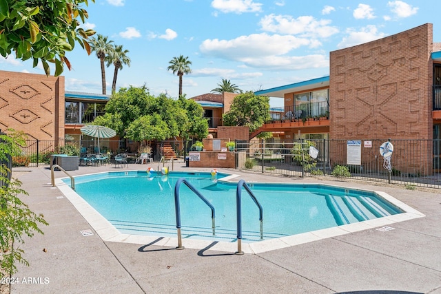 103 E Palm Ln Unit A, Phoenix, AZ 85004 - community pool featuring fence and a patio area