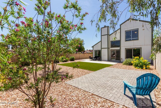 830 E Gila Ln, Chandler, AZ 85225 - back of house with a patio area, a fenced backyard, and a chimney