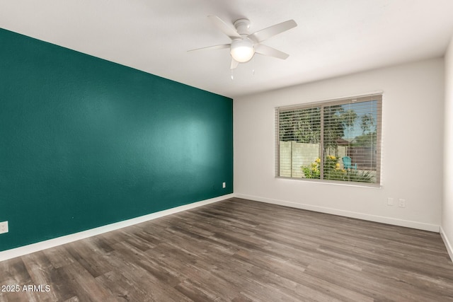 830 E Gila Ln, Chandler, AZ 85225 - unfurnished room featuring a ceiling fan, wood finished floors, and baseboards
