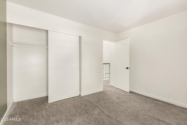 830 E Gila Ln, Chandler, AZ 85225 - unfurnished bedroom with carpet flooring, a closet, and baseboards