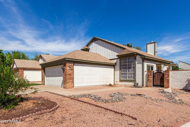 830 E Gila Ln, Chandler, AZ 85225 - ranch-style home with a garage, a gate, a chimney, driveway, and brick siding