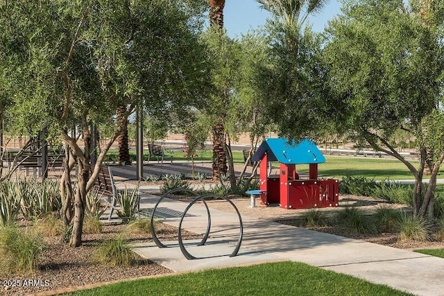 view of home's community with a playground