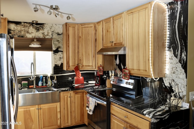 2014 N 17th Pl, Phoenix, AZ 85006 - kitchen featuring stainless steel appliances, dark countertops, under cabinet range hood, and tasteful backsplash