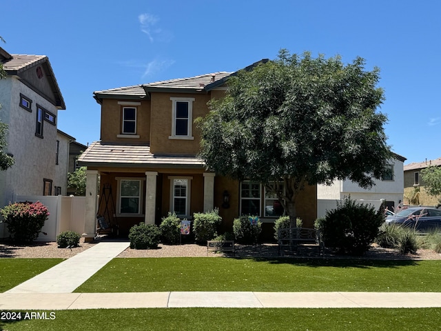 view of front of home featuring a front yard