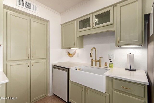 5031 W Grandview Rd, Glendale, AZ 85306 - kitchen with a sink, light countertops, ornamental molding, stainless steel dishwasher, and glass insert cabinets