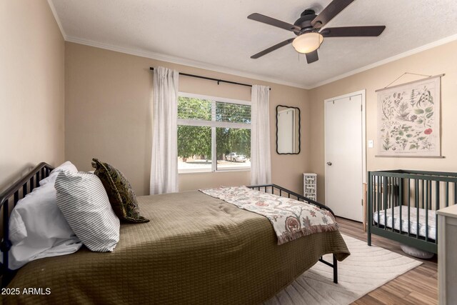 5031 W Grandview Rd, Glendale, AZ 85306 - bedroom with wood finished floors, ornamental molding, and ceiling fan