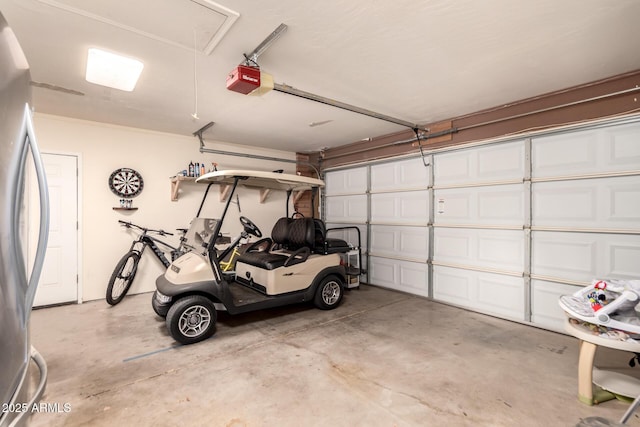 5031 W Grandview Rd, Glendale, AZ 85306 - garage with a garage door opener and freestanding refrigerator