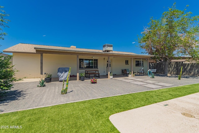 5031 W Grandview Rd, Glendale, AZ 85306 - back of property with a patio area, central AC unit, and stucco siding